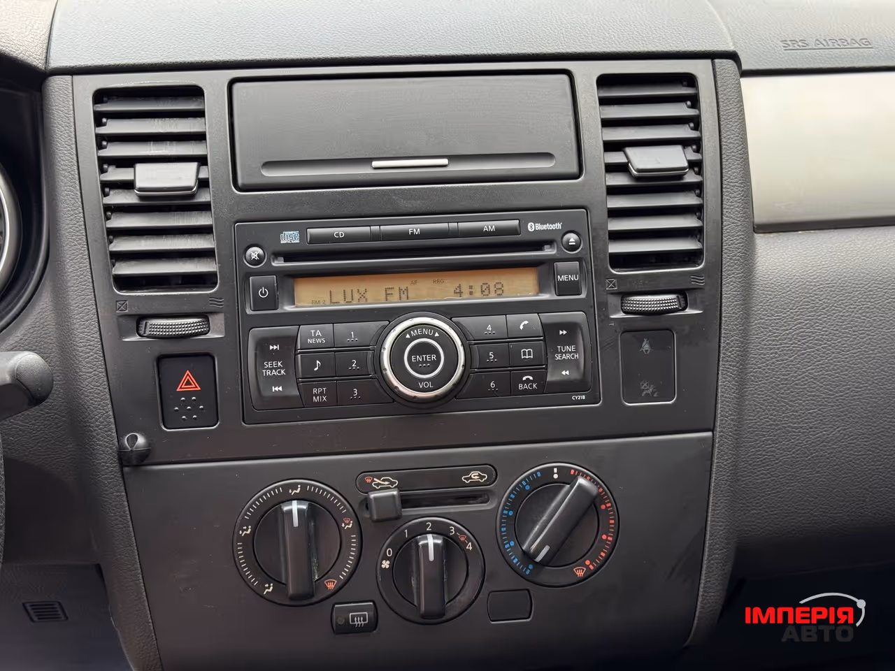 Nissan Tiida - фото 29