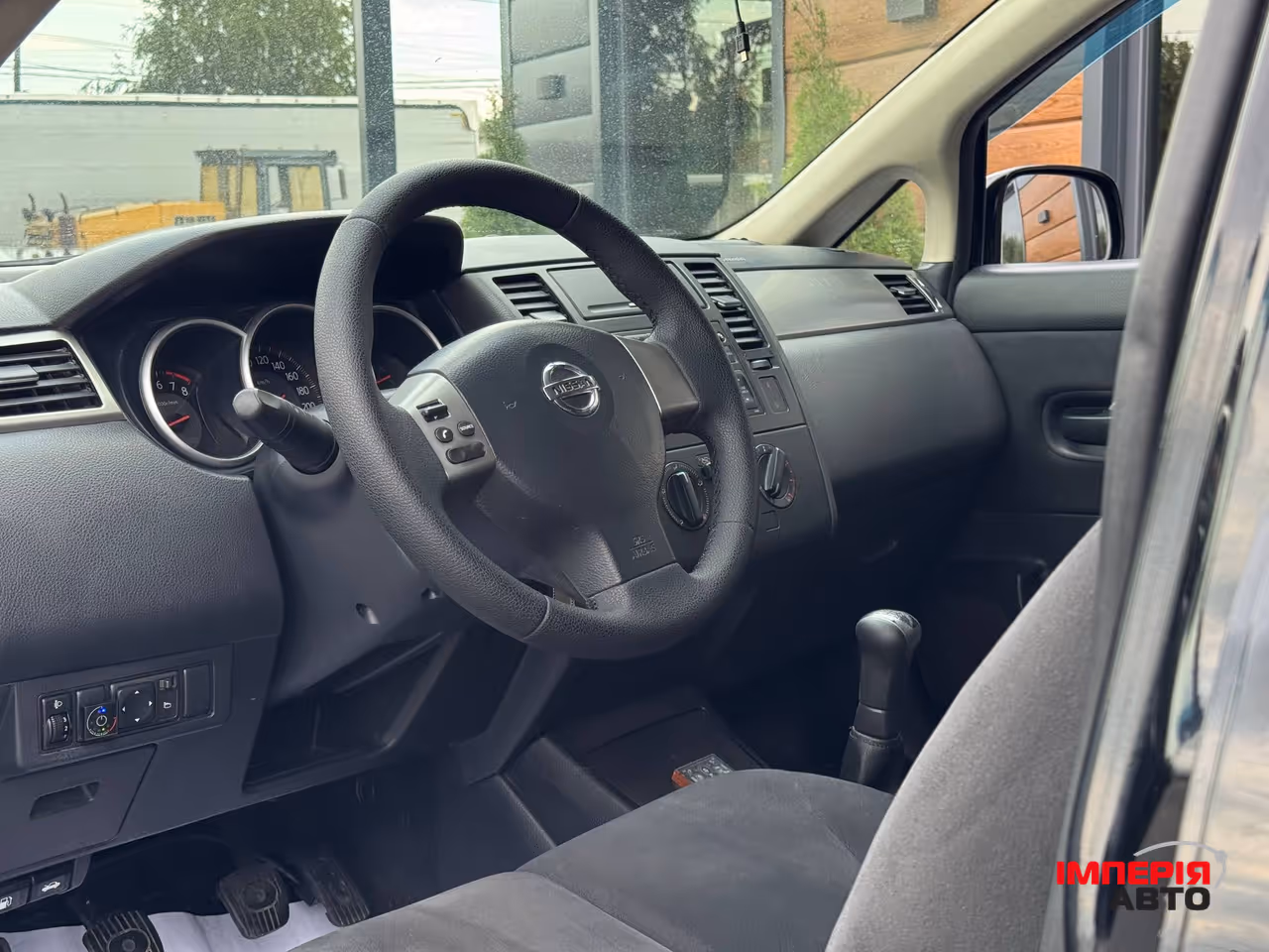 Nissan Tiida - фото 18