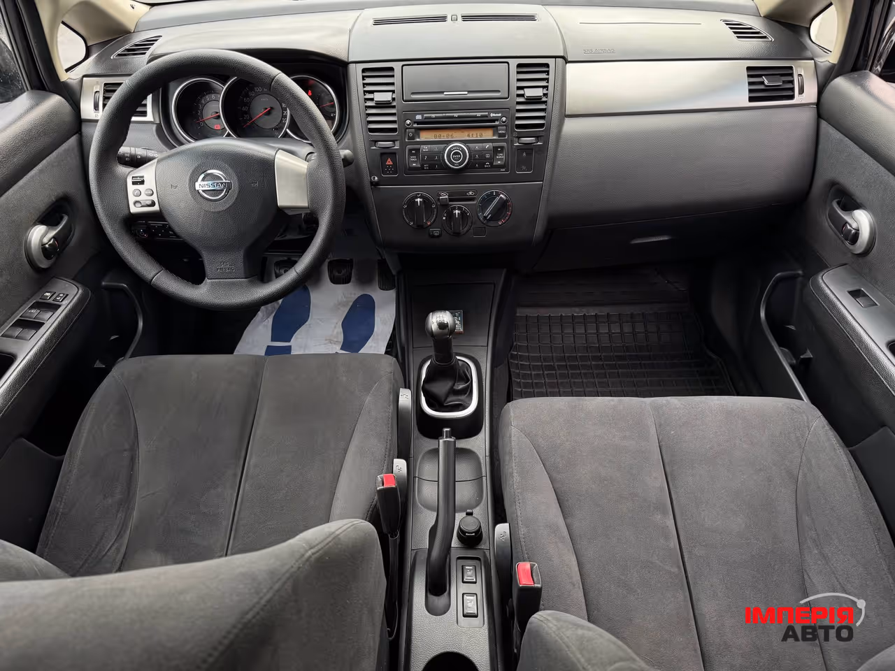 Nissan Tiida - фото 39