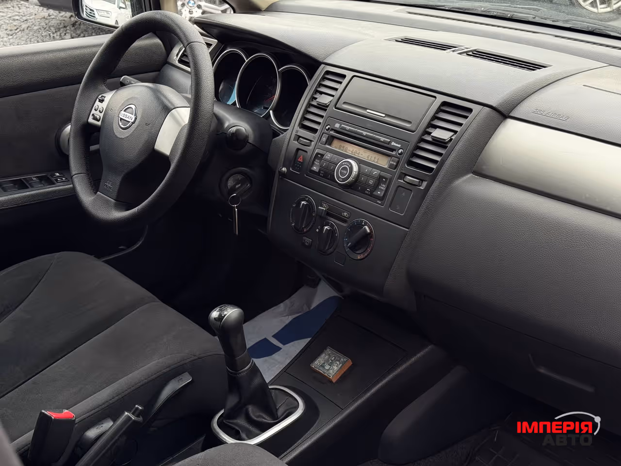 Nissan Tiida - фото 44