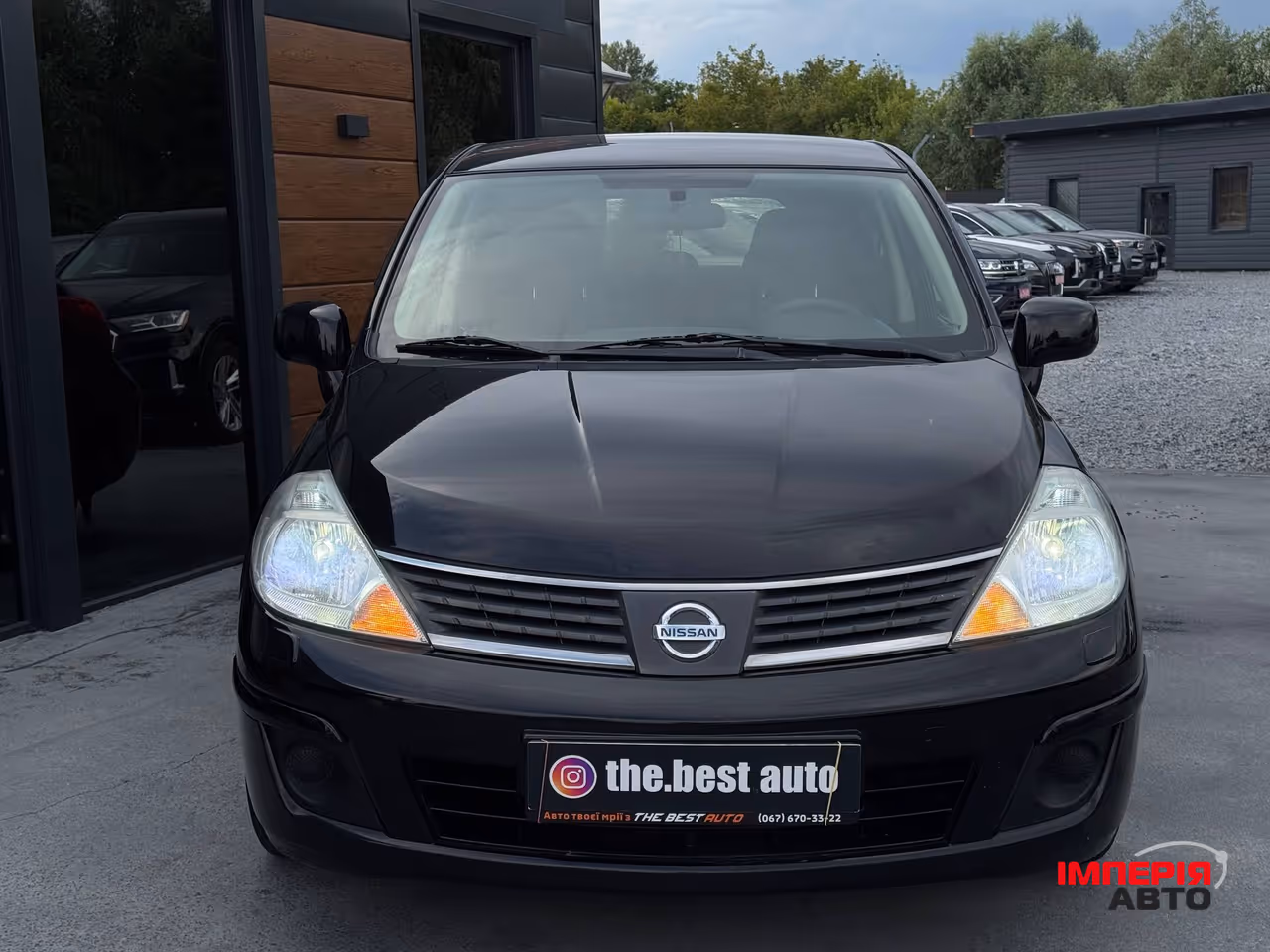 Nissan Tiida - фото 6