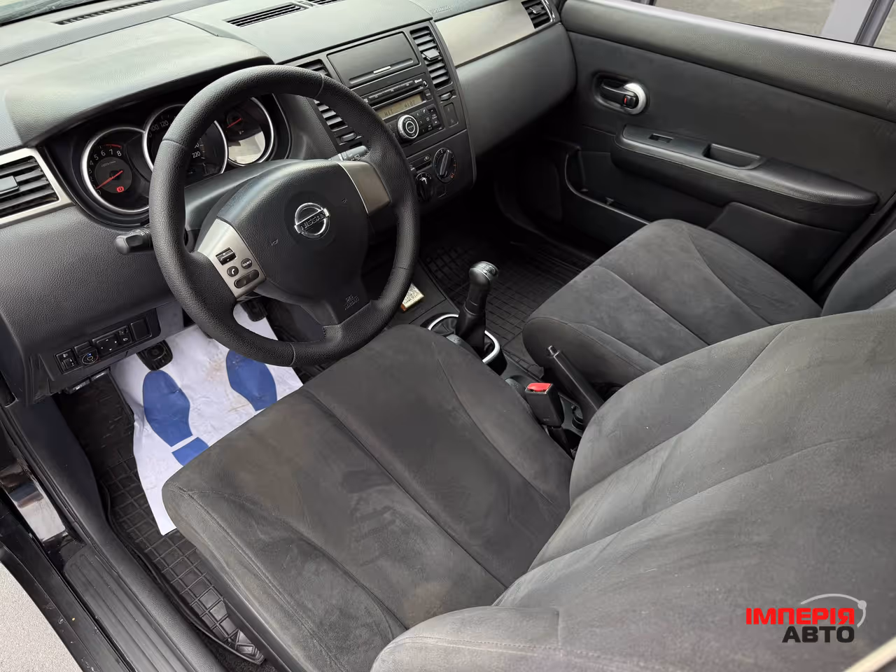 Nissan Tiida - фото 19