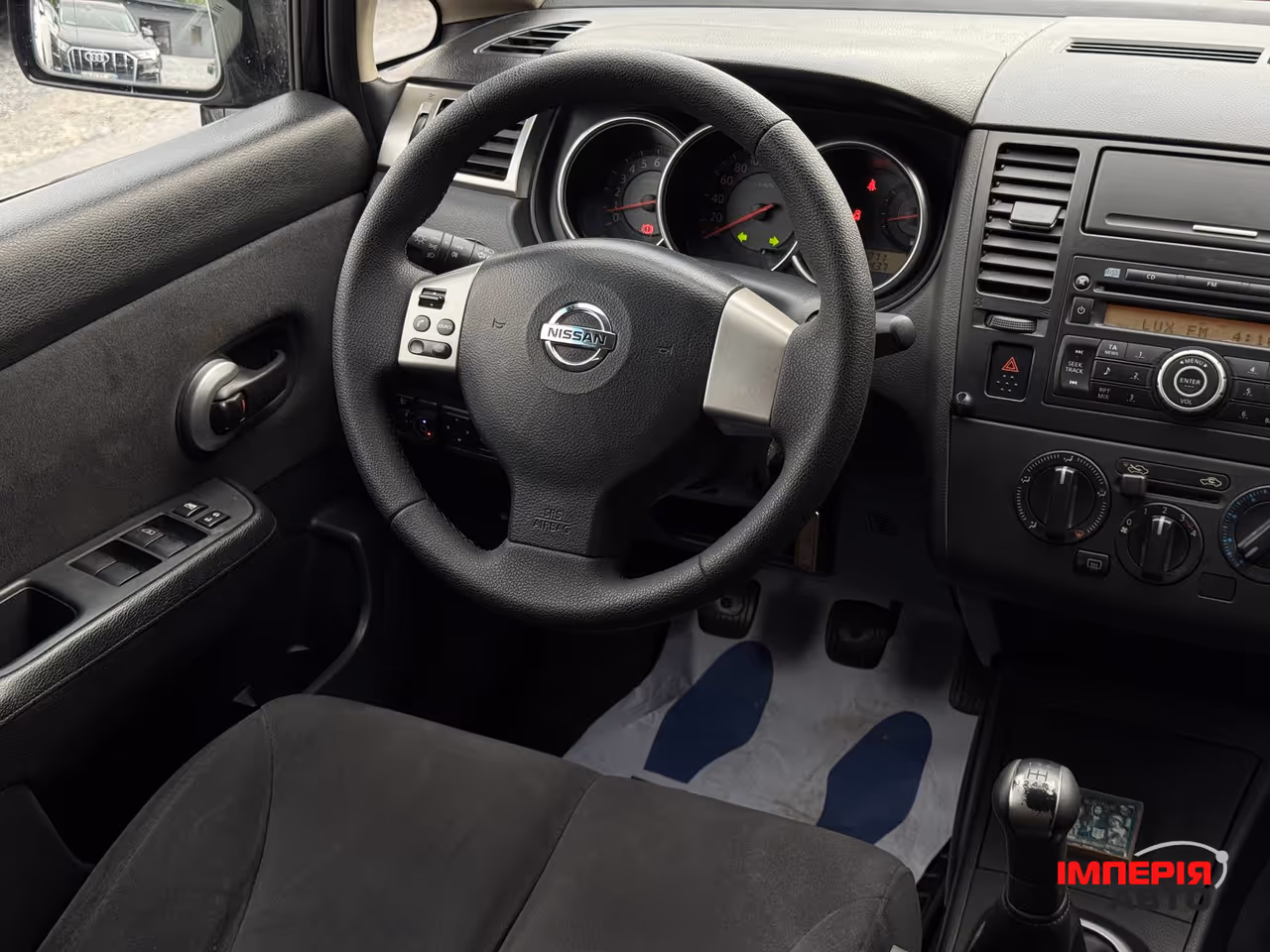 Nissan Tiida - фото 37