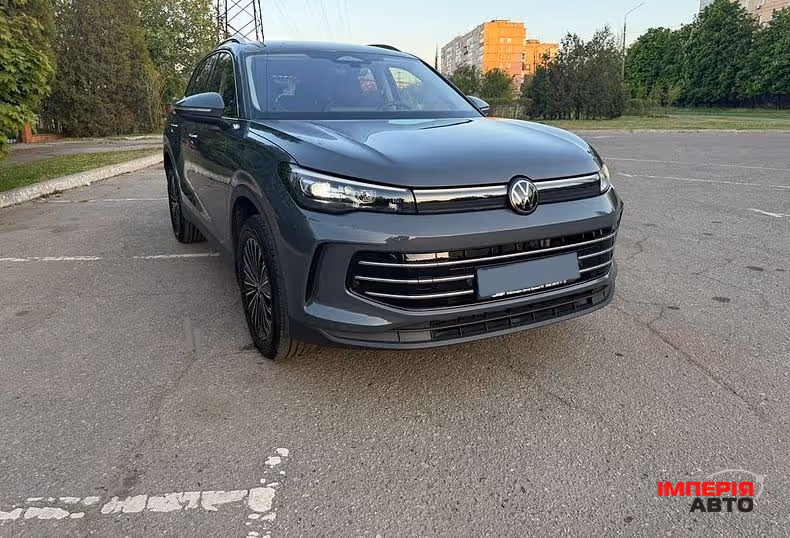 Volkswagen Tiguan - фото 1