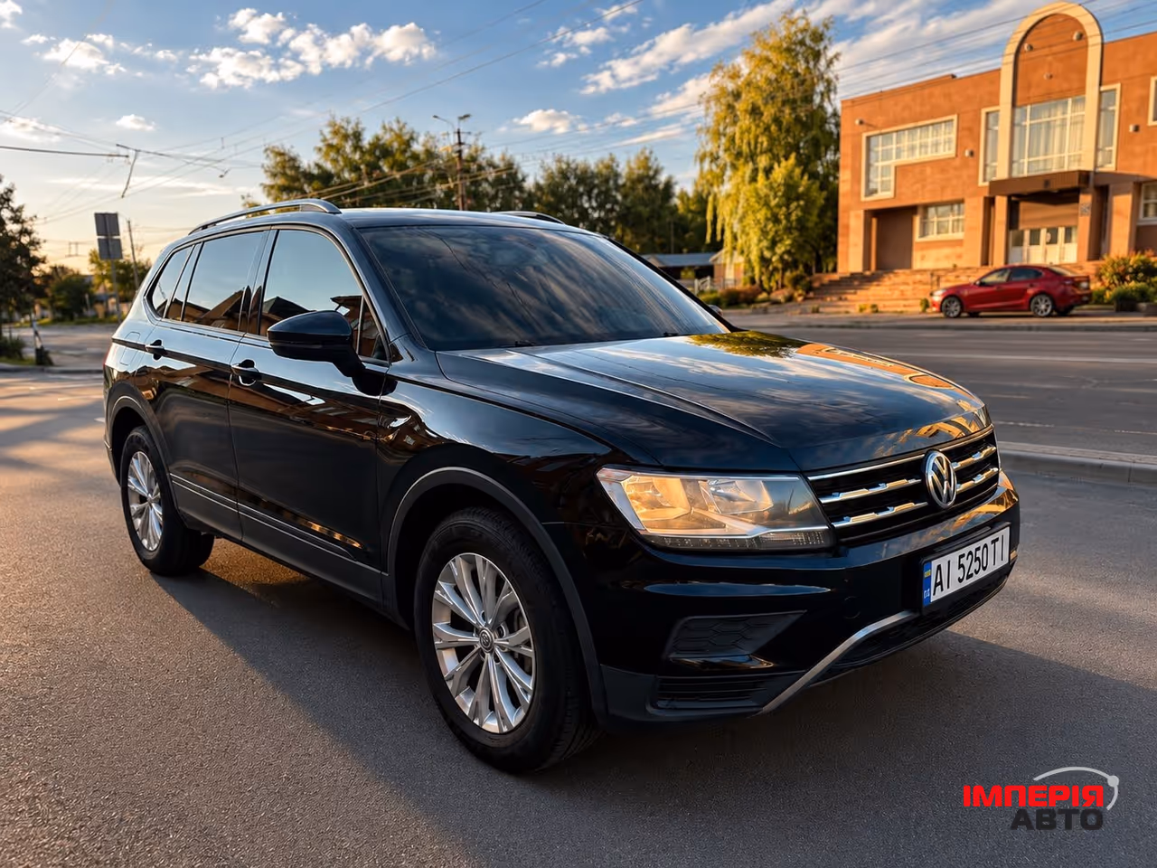 Volkswagen Tiguan - фото 1