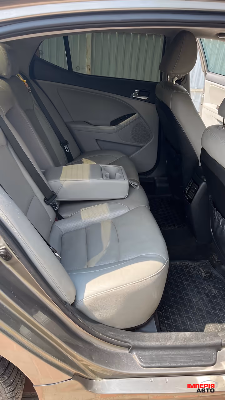 Kia Optima - фото 15