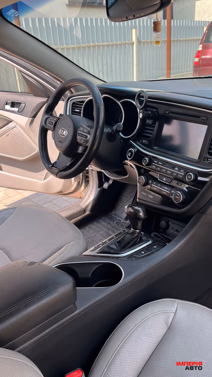 Kia Optima - фото 14