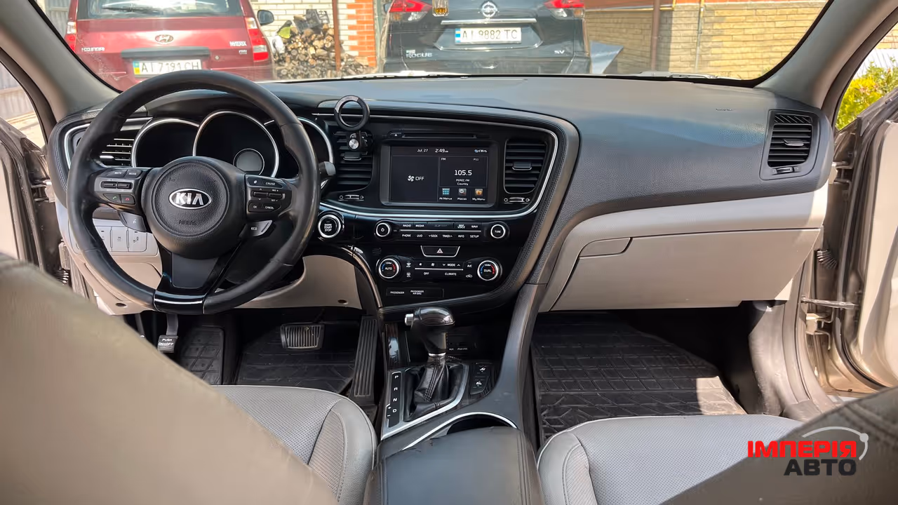 Kia Optima - фото 21