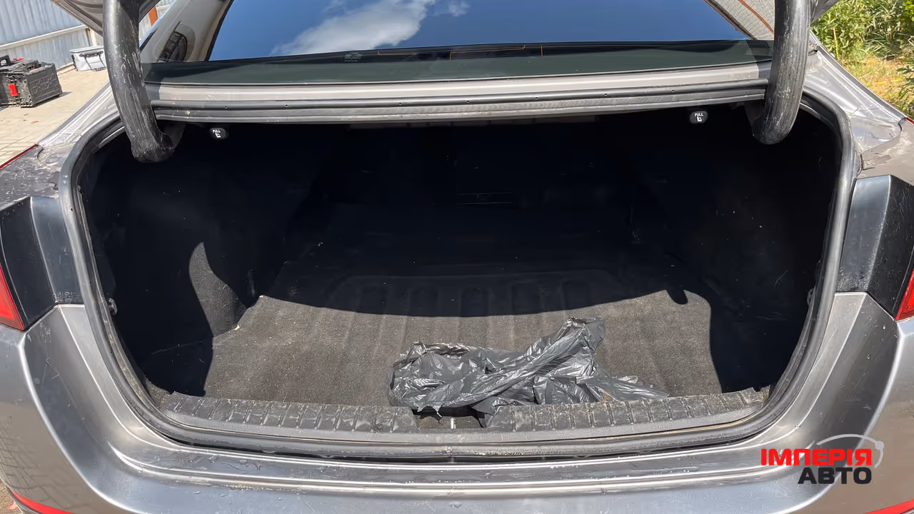 Kia Optima - фото 8