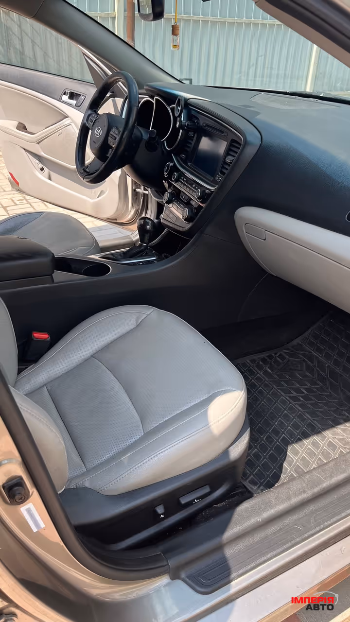 Kia Optima - фото 12