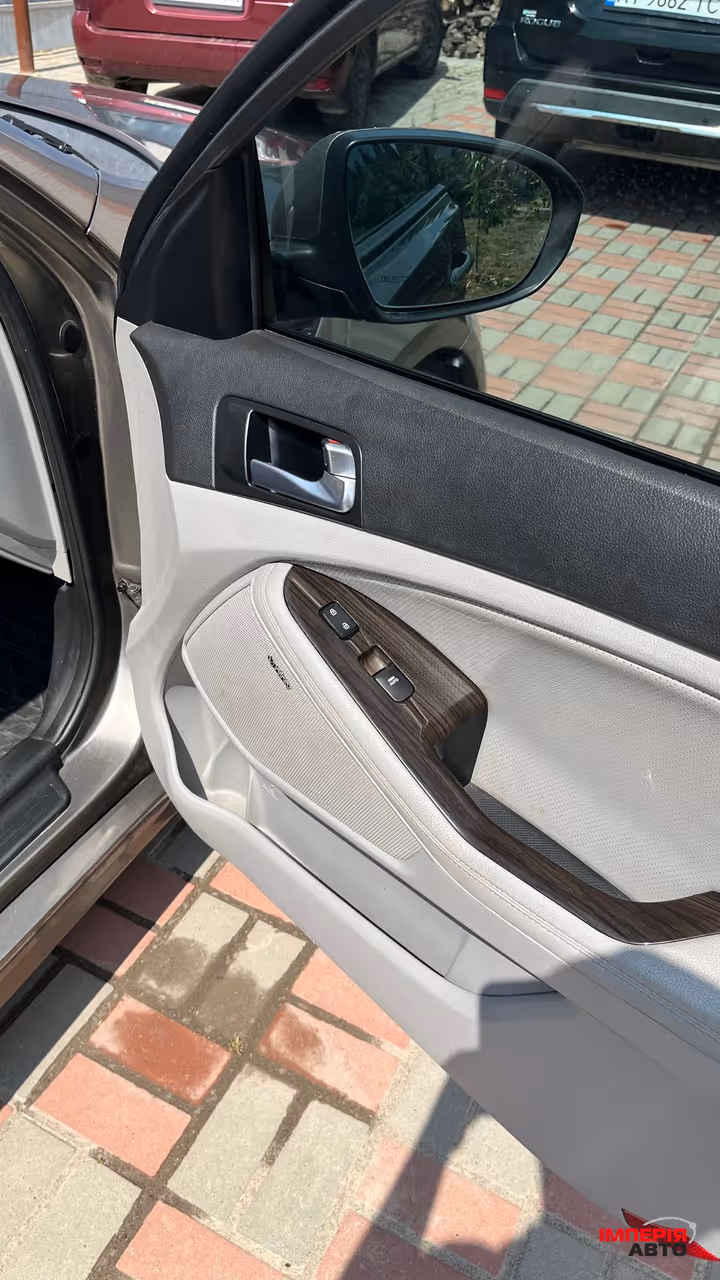 Kia Optima - фото 13