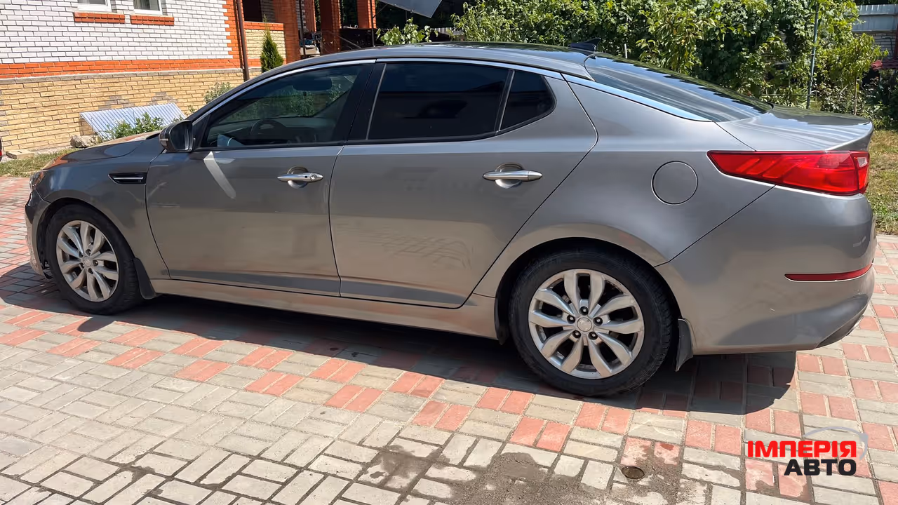 Kia Optima - фото 7