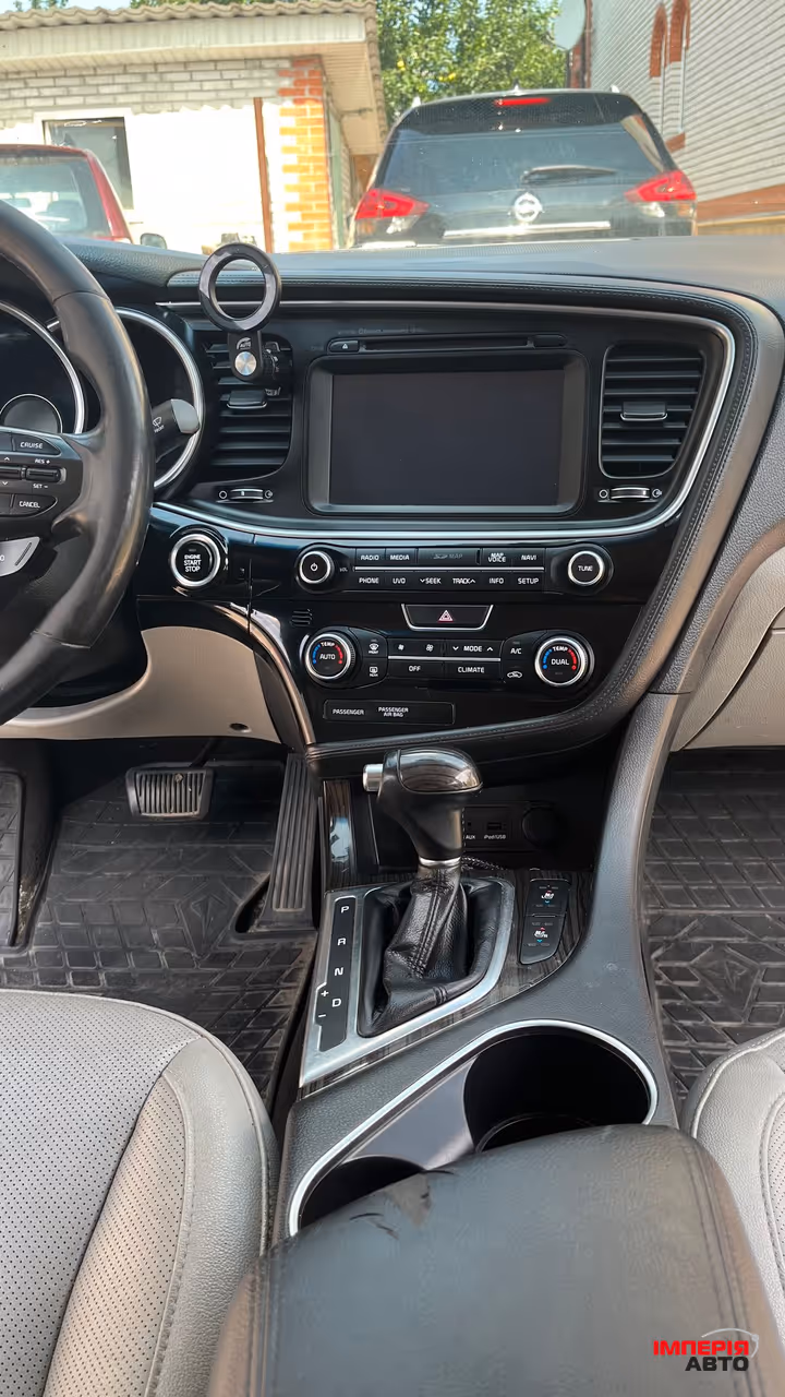 Kia Optima - фото 18
