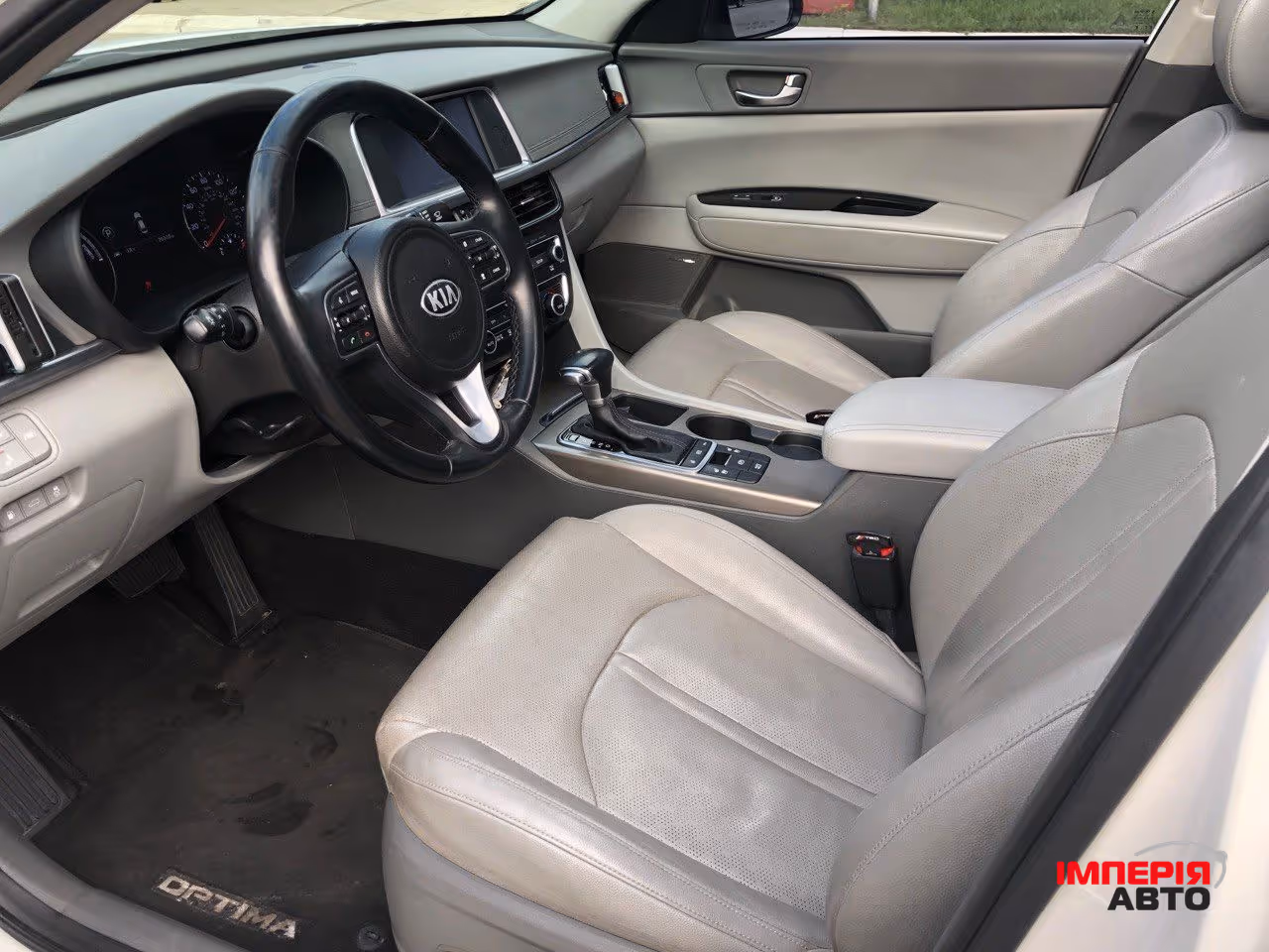 Kia Optima - фото 3