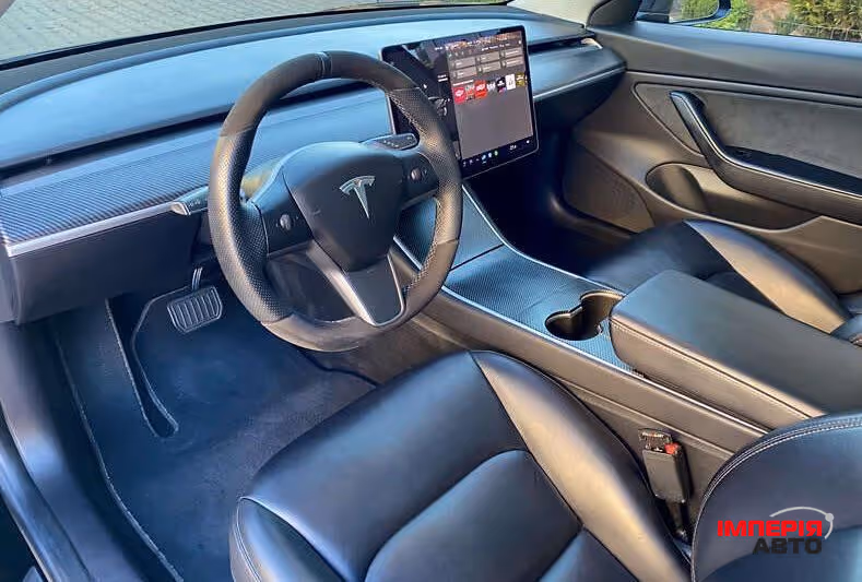 Tesla Model 3 - фото 8