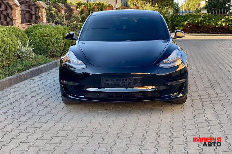 Tesla Model 3 - фото 1