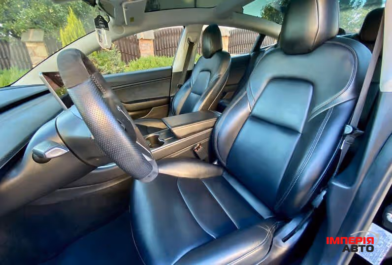 Tesla Model 3 - фото 9