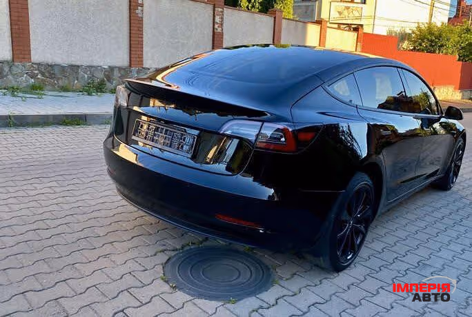 Tesla Model 3 - фото 7