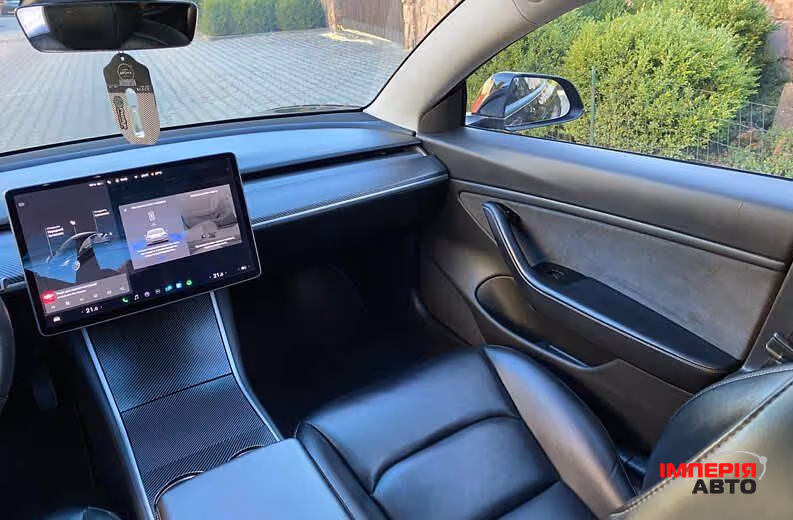 Tesla Model 3 - фото 11
