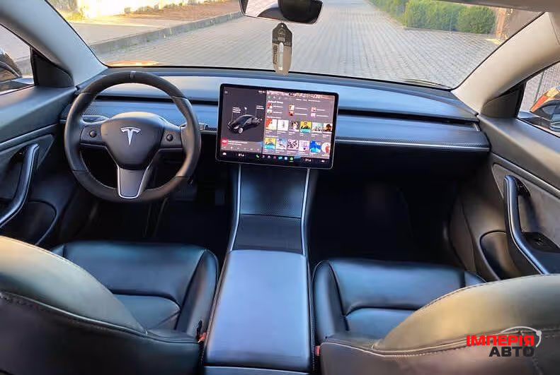 Tesla Model 3 - фото 12