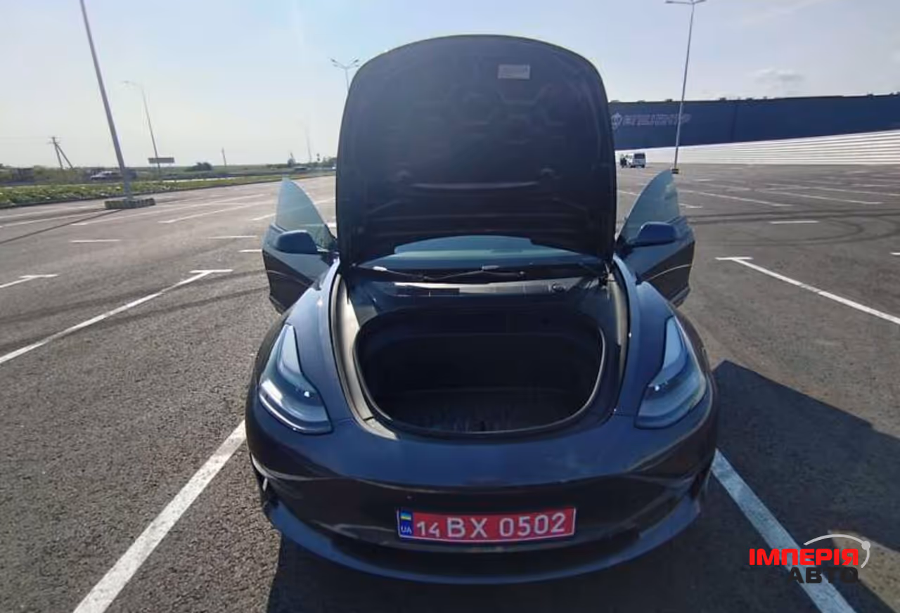 Tesla Model 3 - фото 13