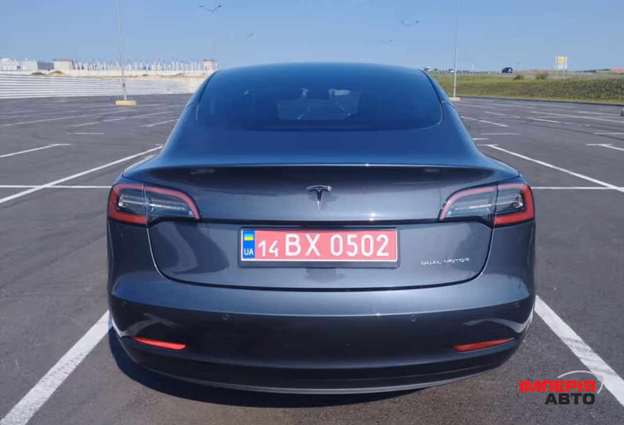 Tesla Model 3 - фото 11