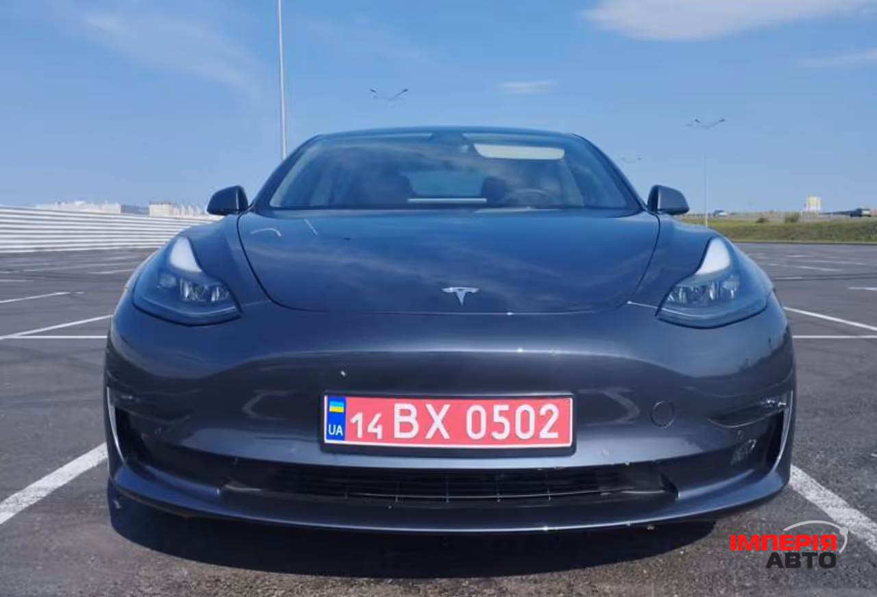 Tesla Model 3 - фото 12