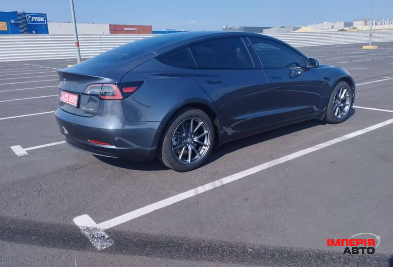 Tesla Model 3 - фото 10
