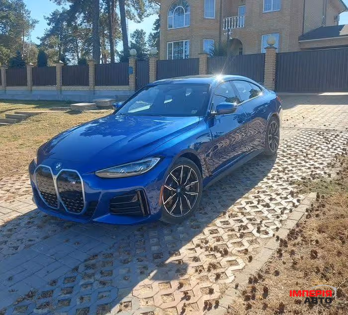 BMW i4 - фото 1