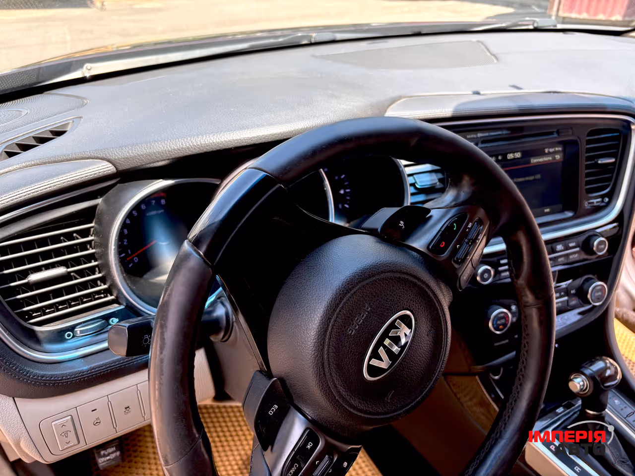 Kia Optima - фото 8