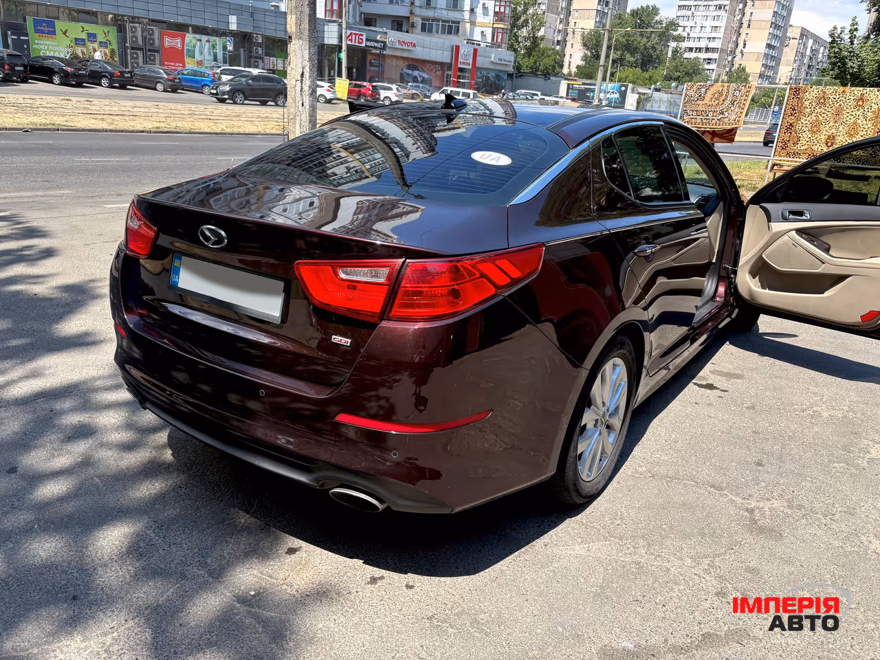 Kia Optima - фото 4