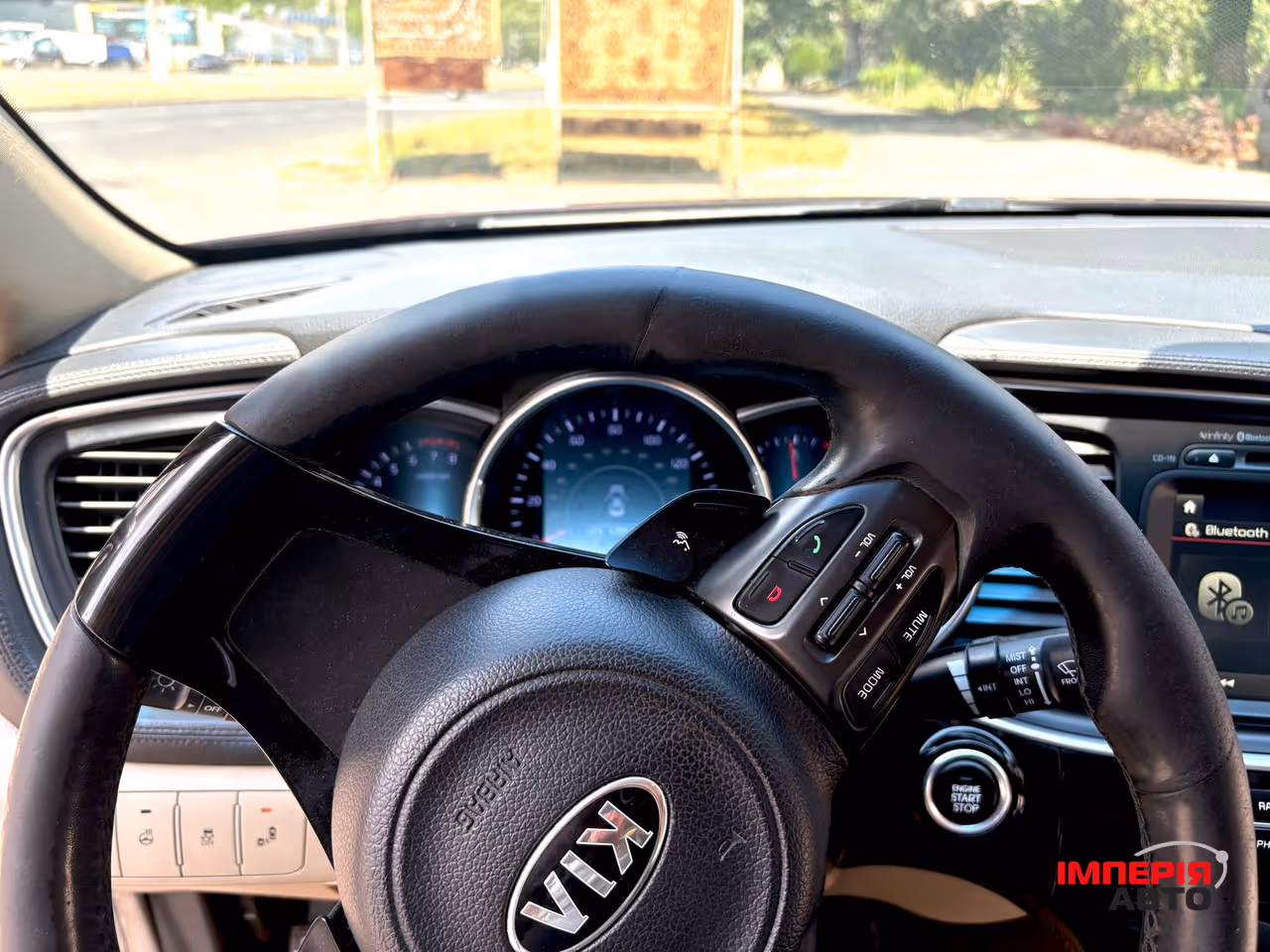 Kia Optima - фото 6