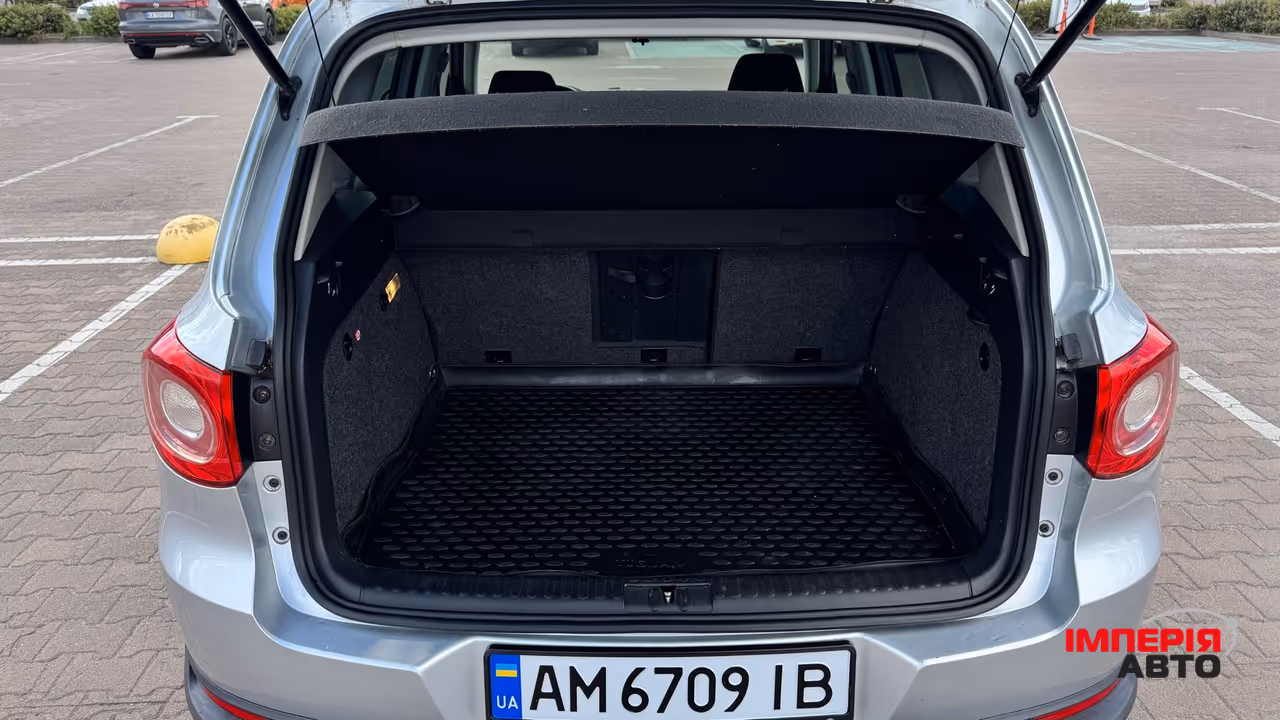 Volkswagen Tiguan - фото 11