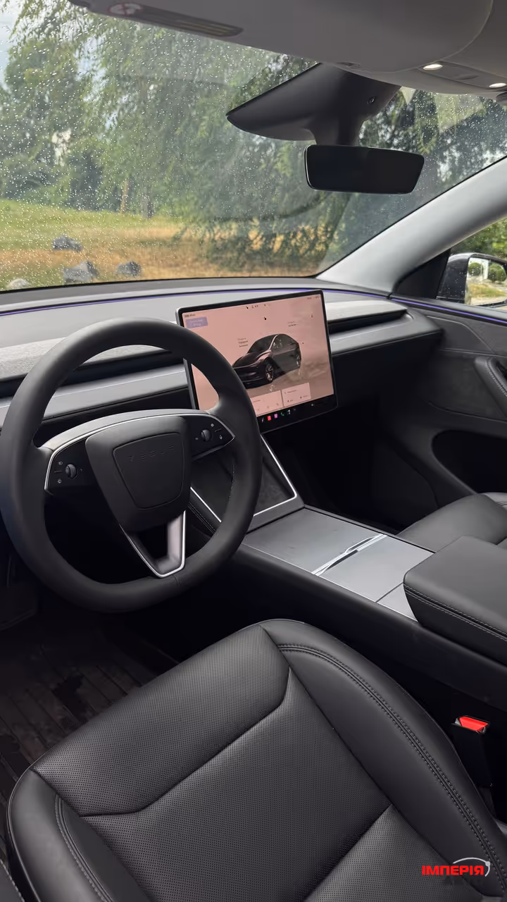 Tesla Model Y - фото 11
