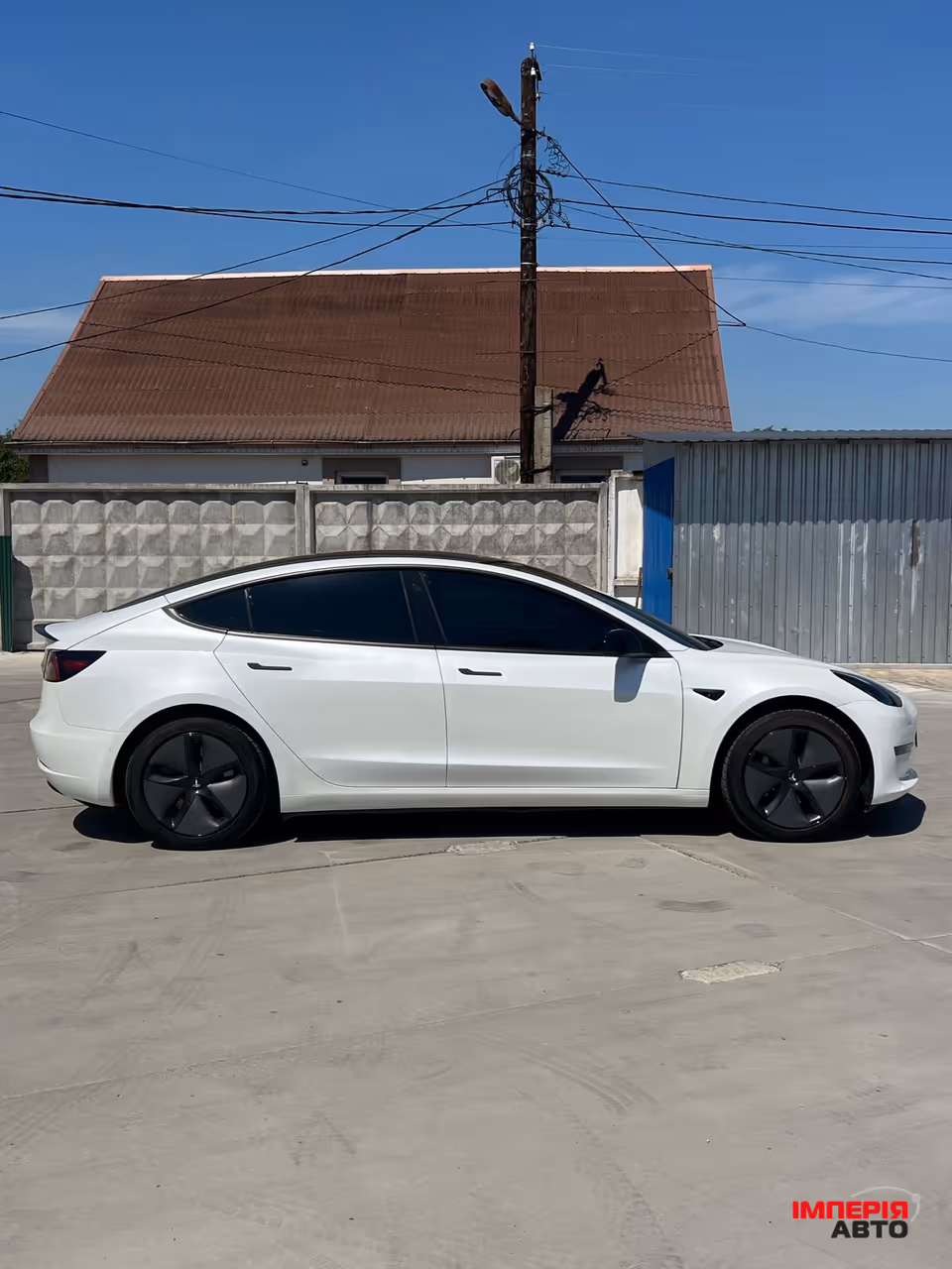 Tesla Model 3 - фото 11
