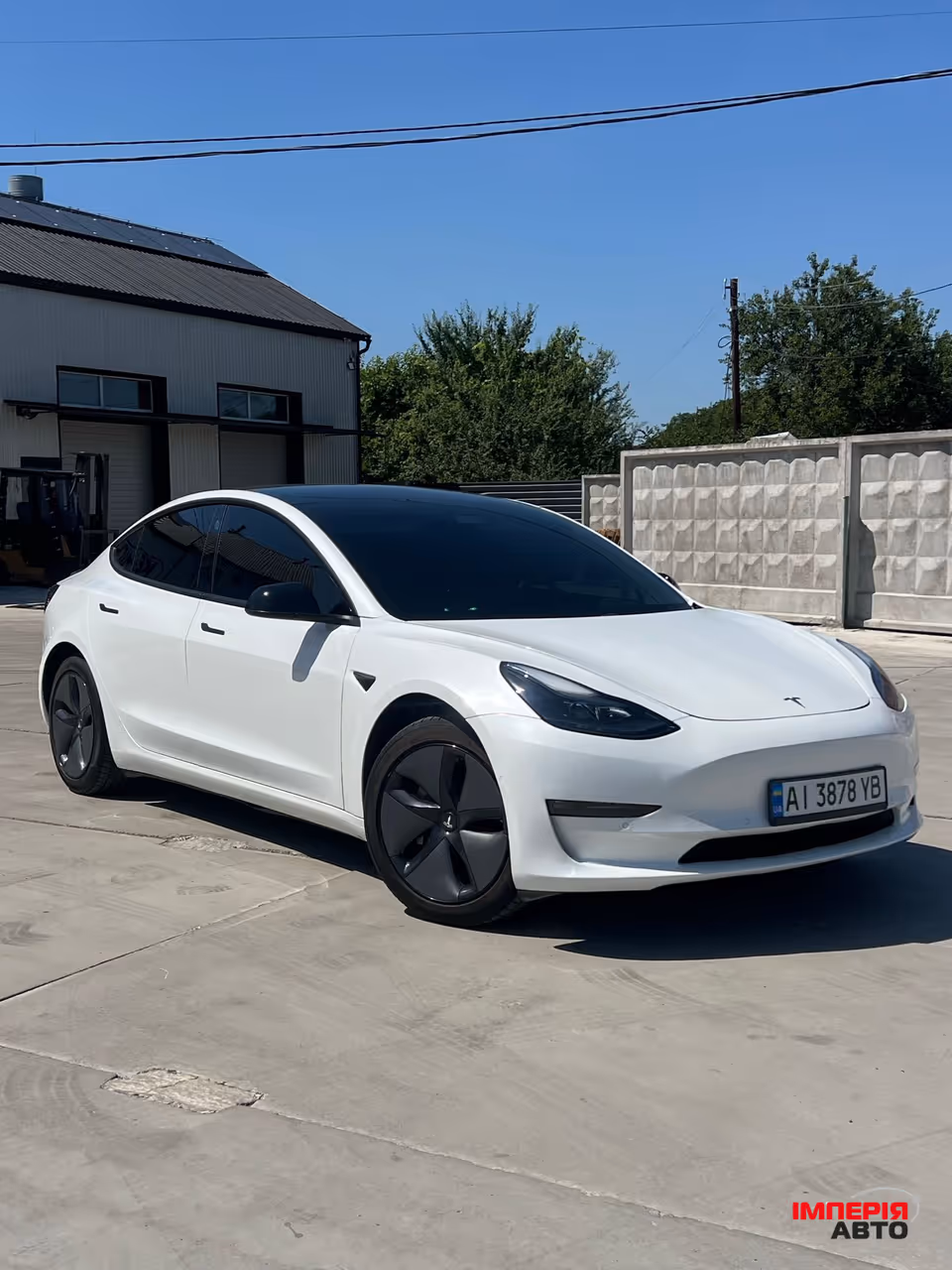 Tesla Model 3 - фото 1
