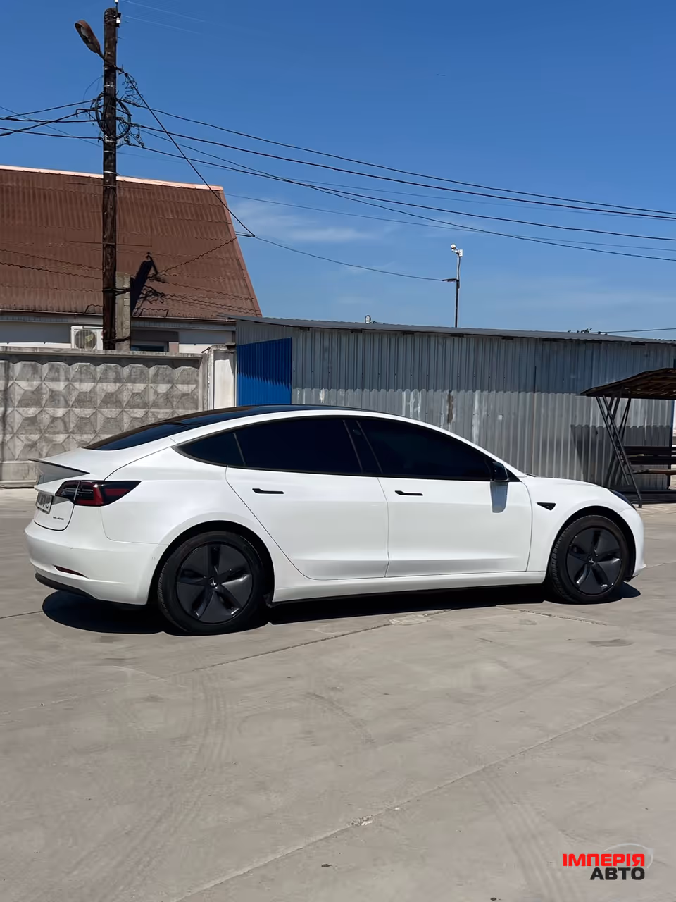Tesla Model 3 - фото 12