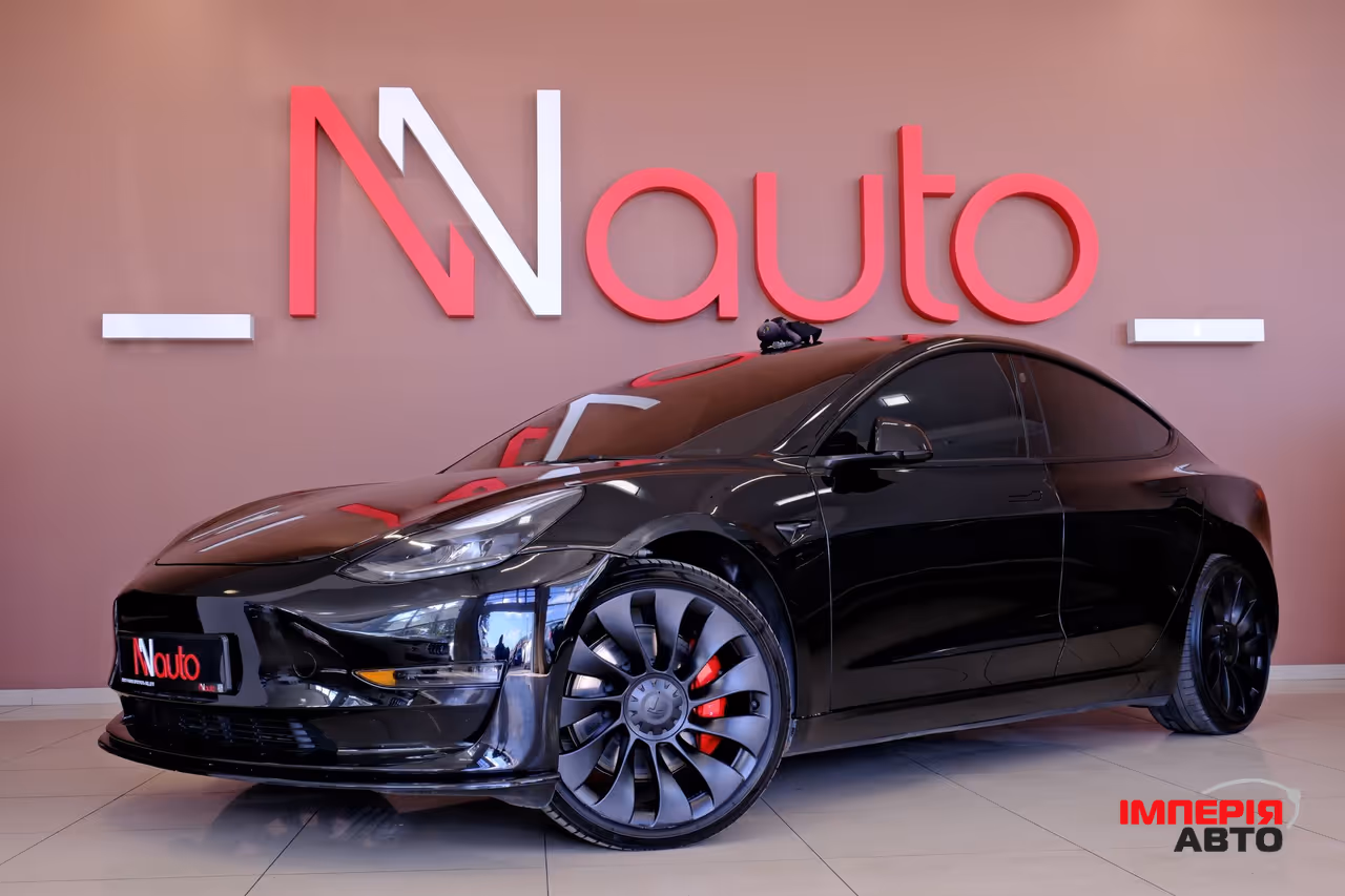Tesla Model 3 - фото 1