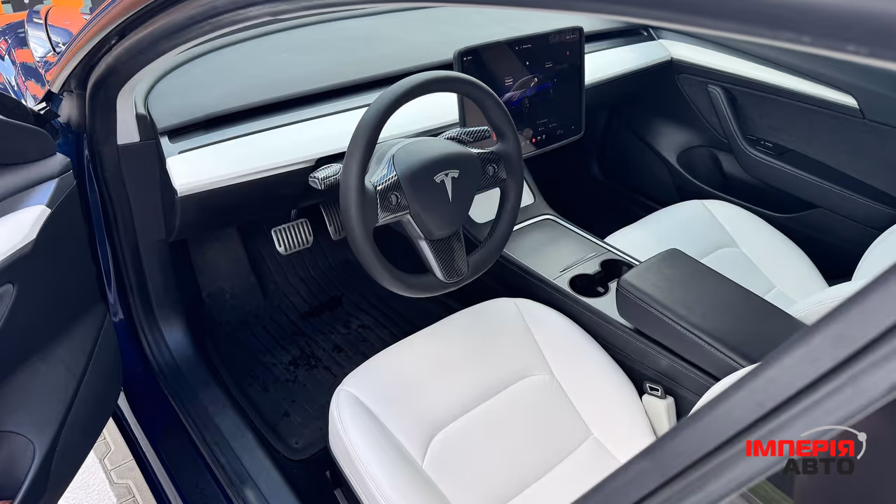 Tesla Model 3 - фото 12