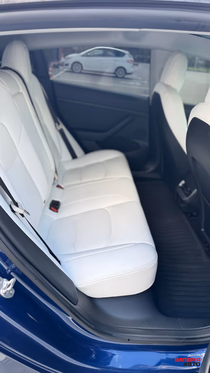 Tesla Model 3 - фото 14