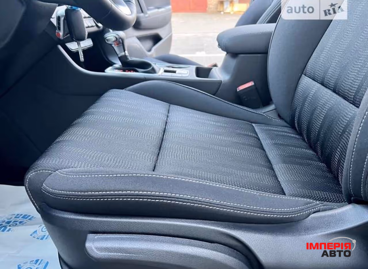 Kia Sportage - фото 9