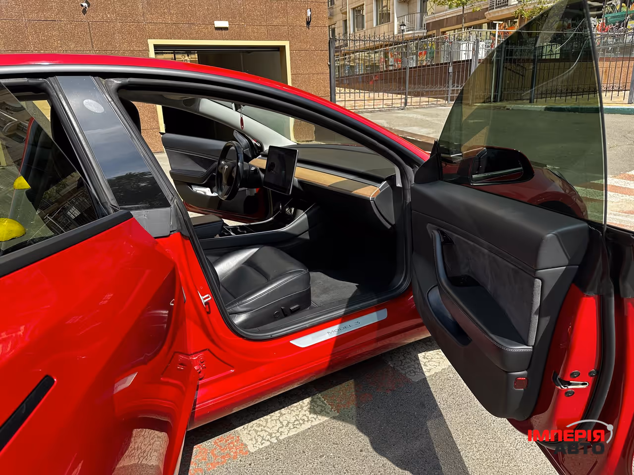 Tesla Model 3 - фото 9