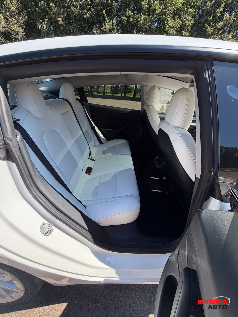 Tesla Model 3 - фото 12