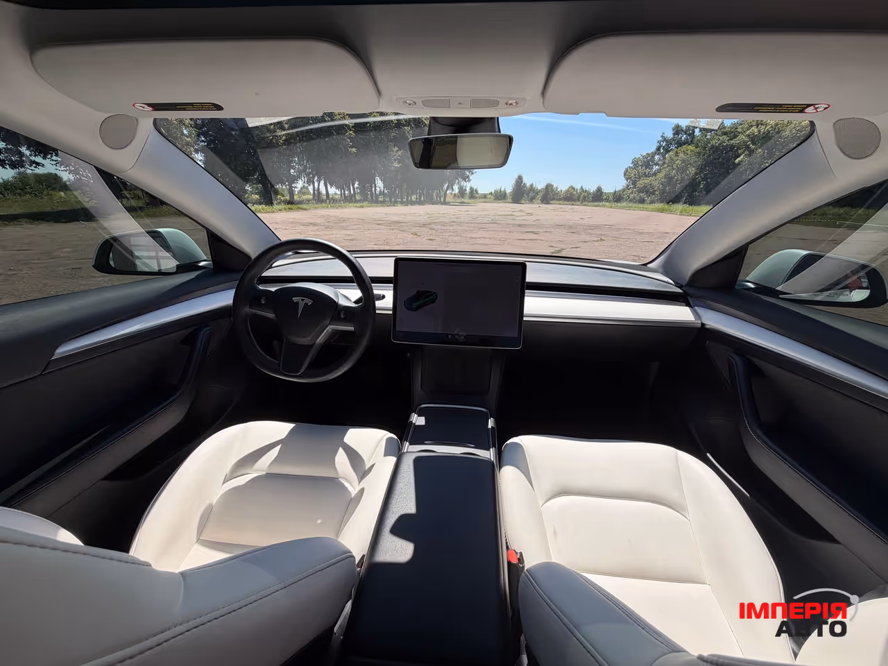 Tesla Model 3 - фото 13