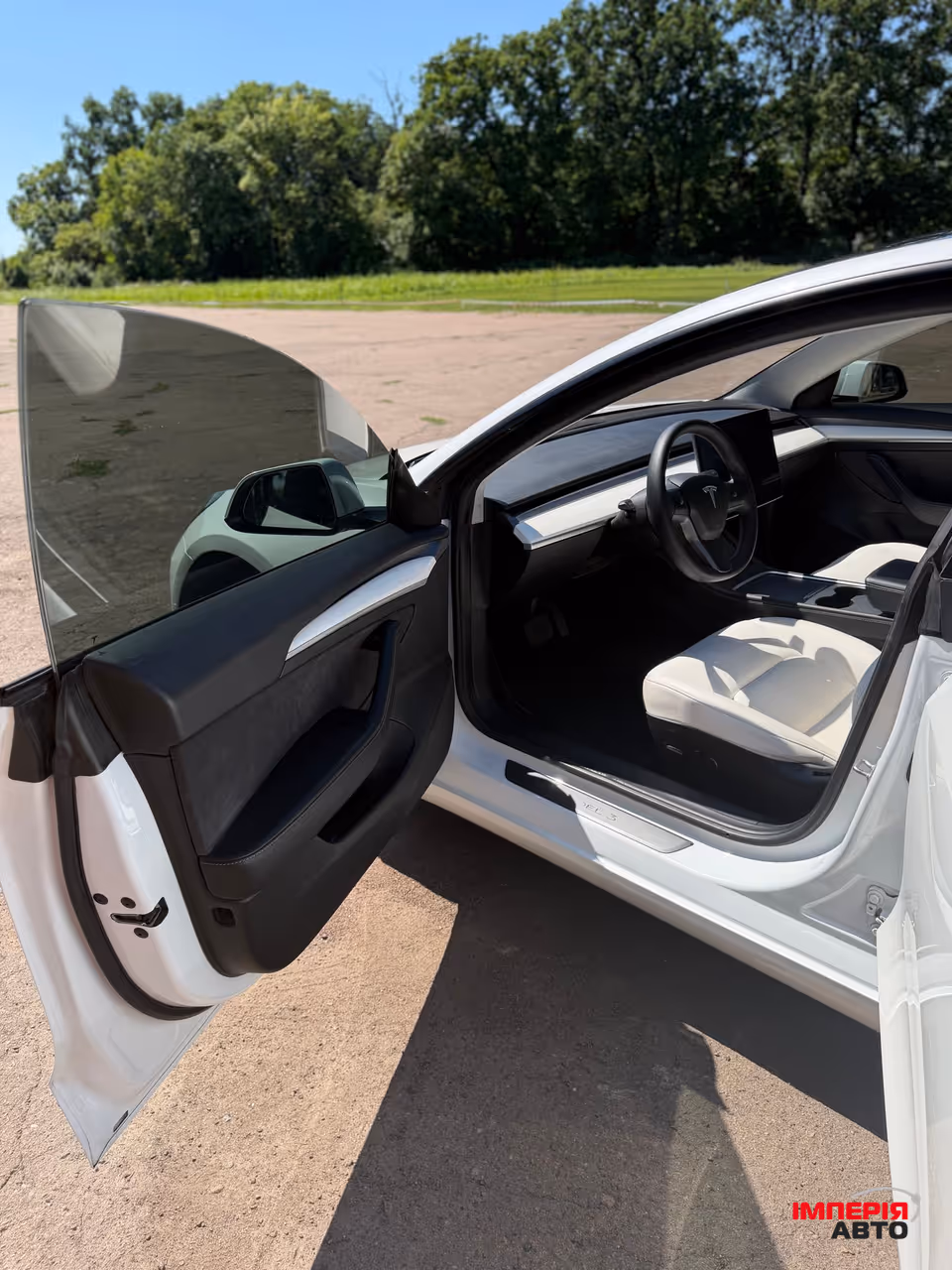 Tesla Model 3 - фото 15