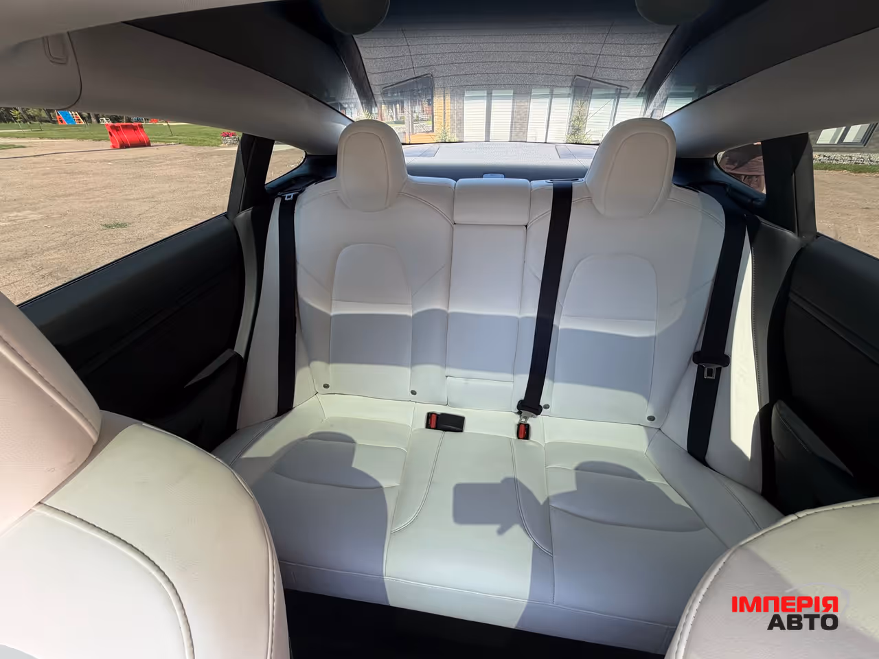 Tesla Model 3 - фото 11