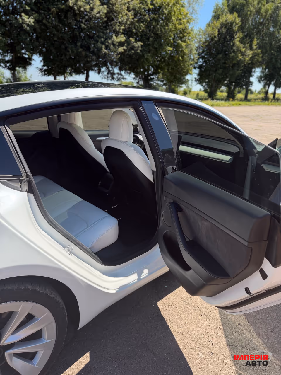 Tesla Model 3 - фото 19