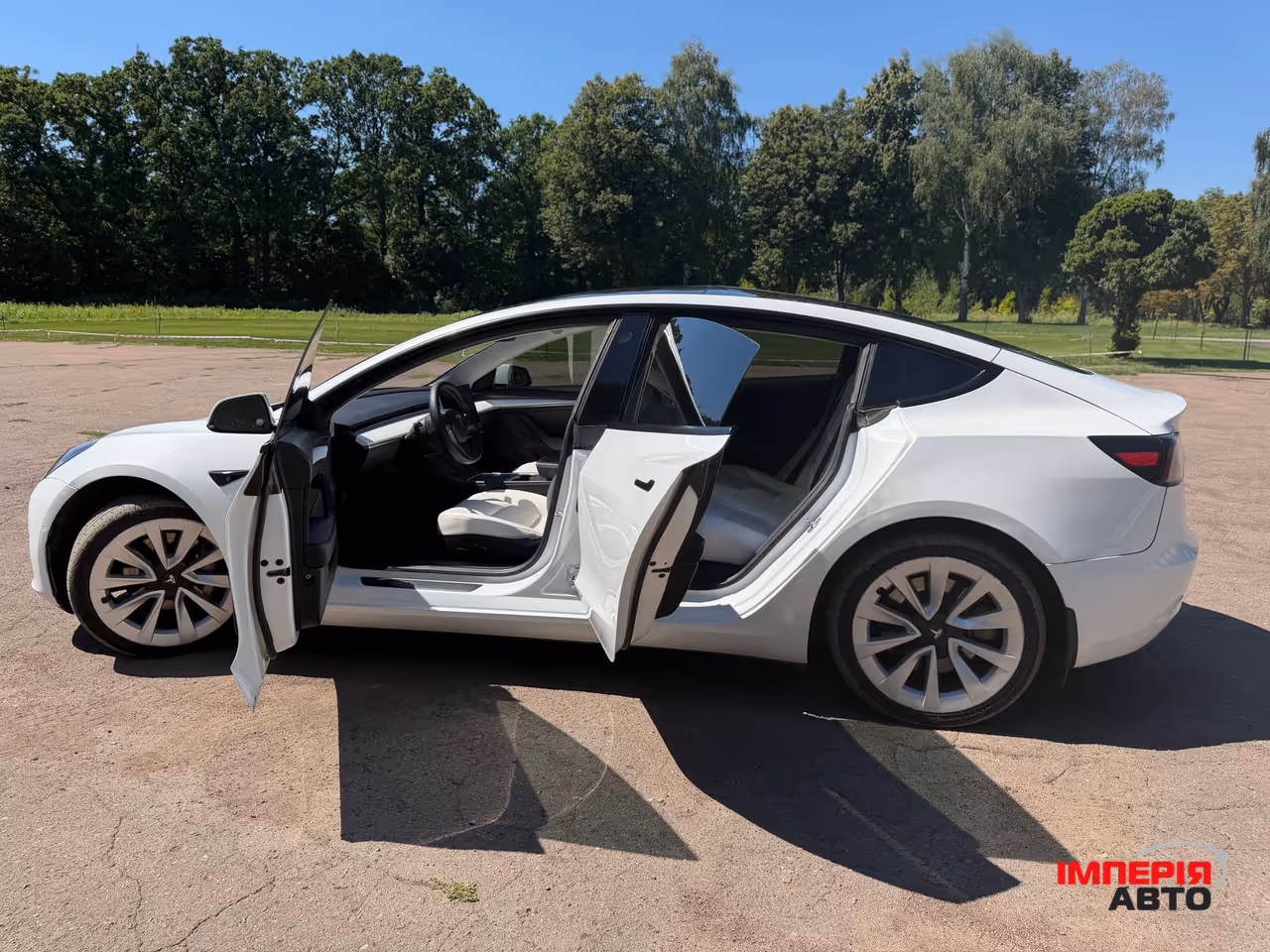 Tesla Model 3 - фото 14