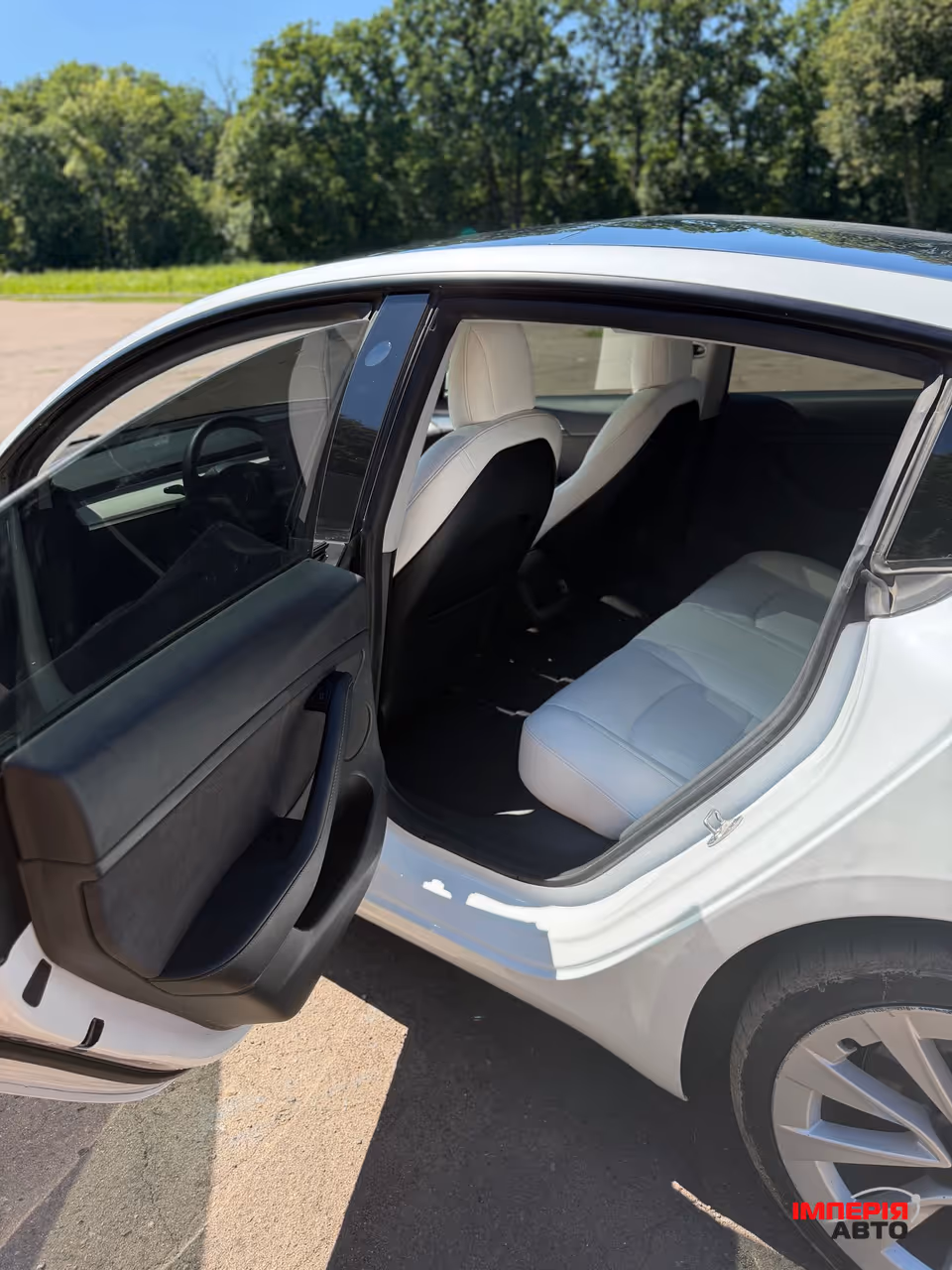 Tesla Model 3 - фото 16