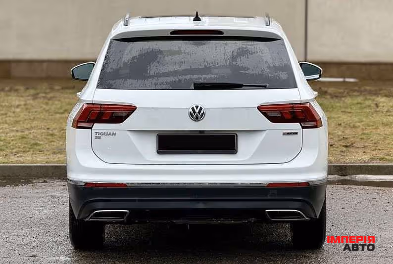 Volkswagen Tiguan - фото 6